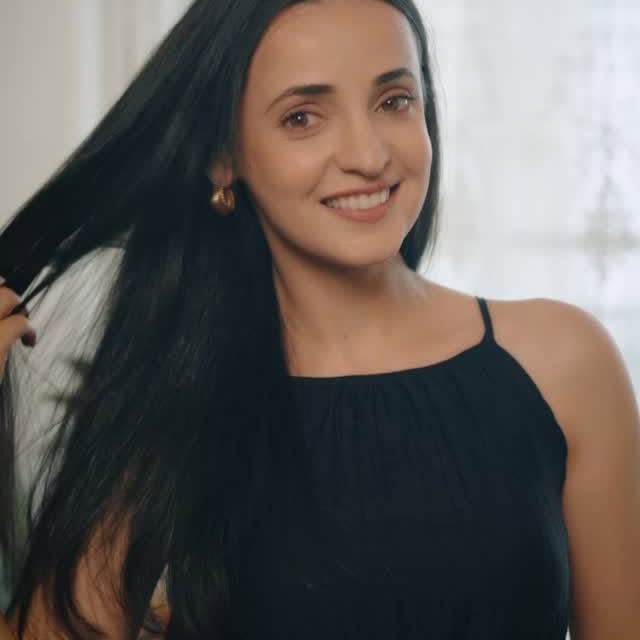 Instagram post by @sanayairani for TRESemmé. Caption reads: Get that professional silk pressed straight look,....