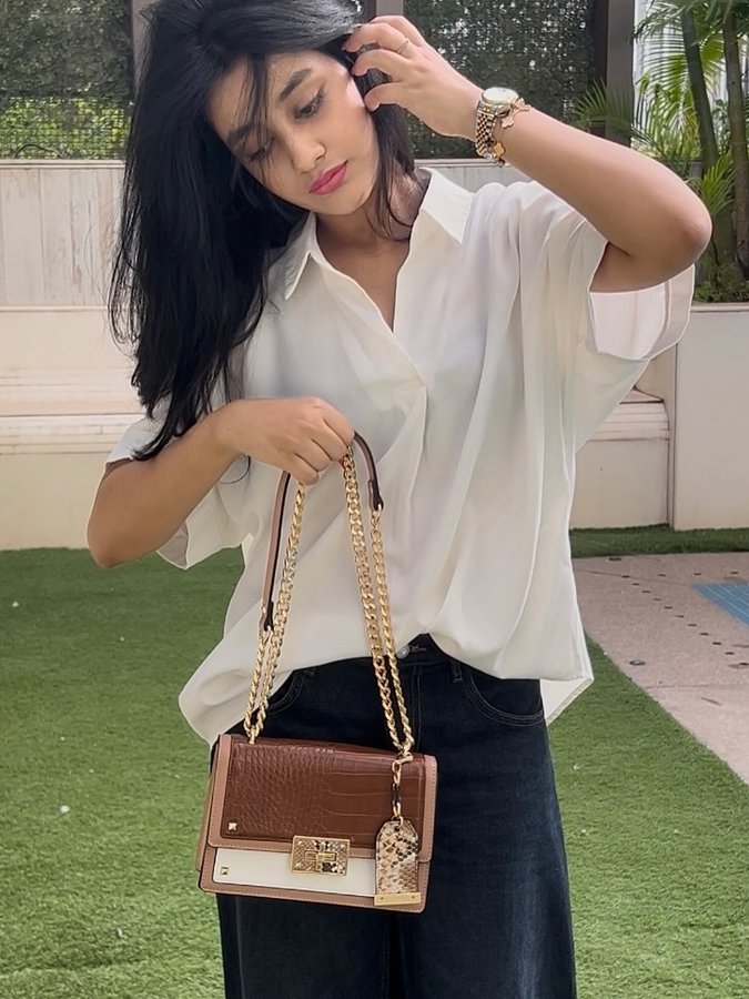 Instagram post by @theonly.zainnn for ALDO Shoes. Caption reads: Excuse me? Its not a bag, its an aldo ✨

Festive....