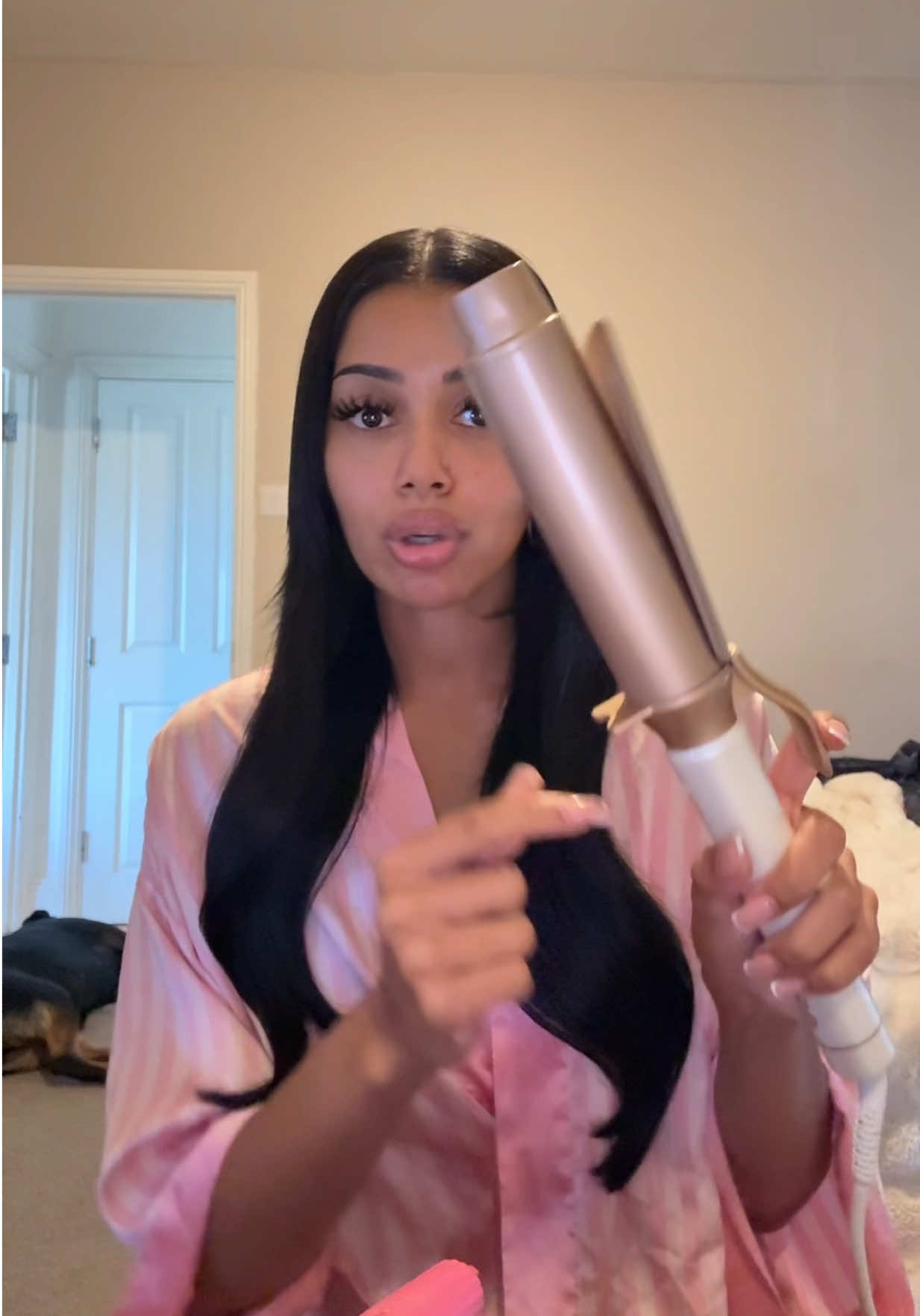 TikTok post by @kiaessib for Beauty Works Professional. Caption reads: Love love love barrel curling my hair, seriously....