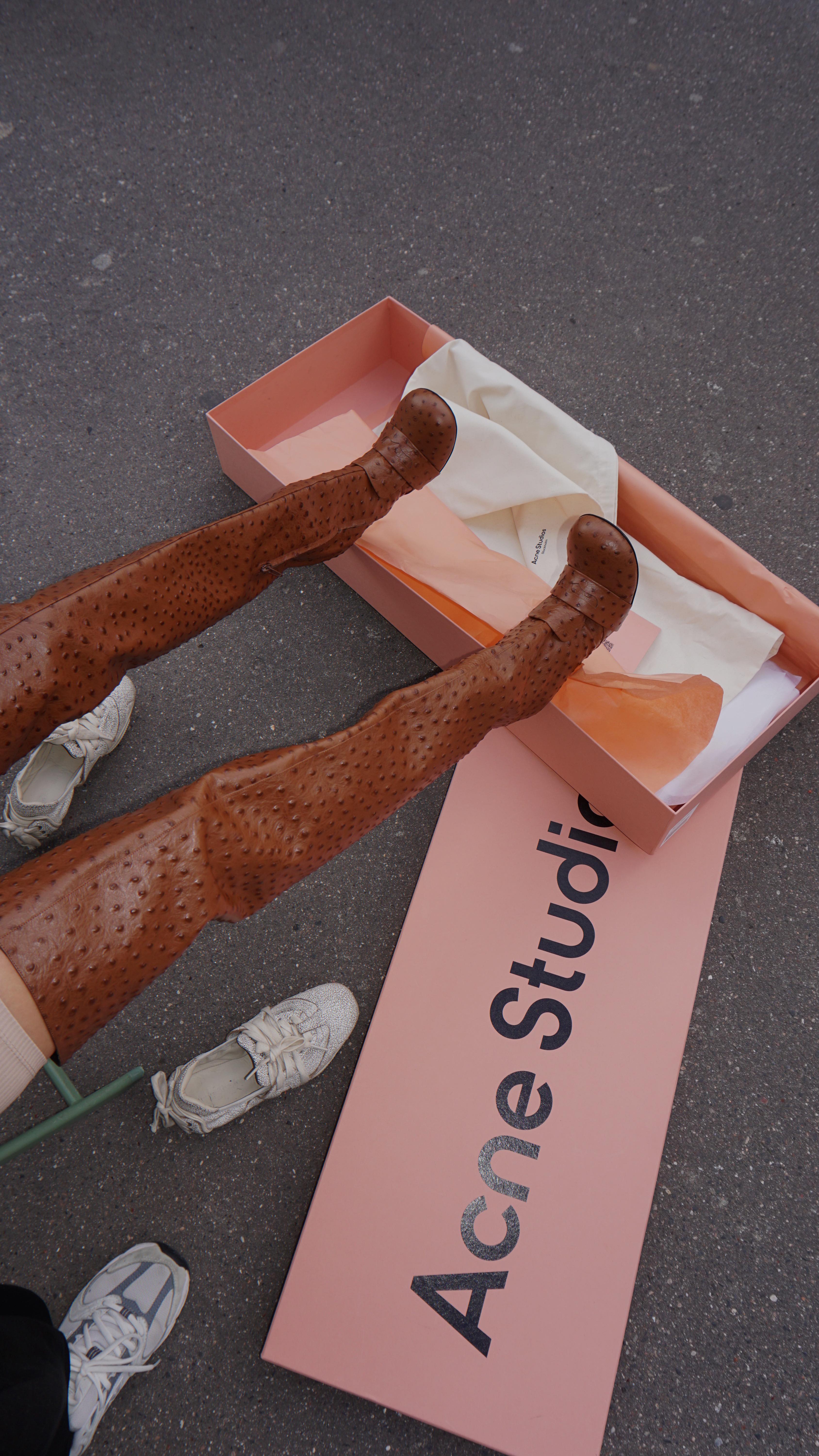 Instagram post by @inna_ist for Acne Studios. Caption reads: Unboxing @acnestudios.