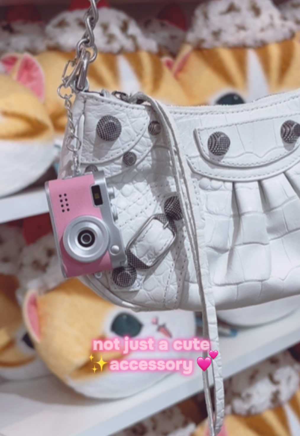 TikTok post by @madeline_kennedy for Fitpolo. Caption reads: took my mini cam from @HOTU US to @MINISO United....