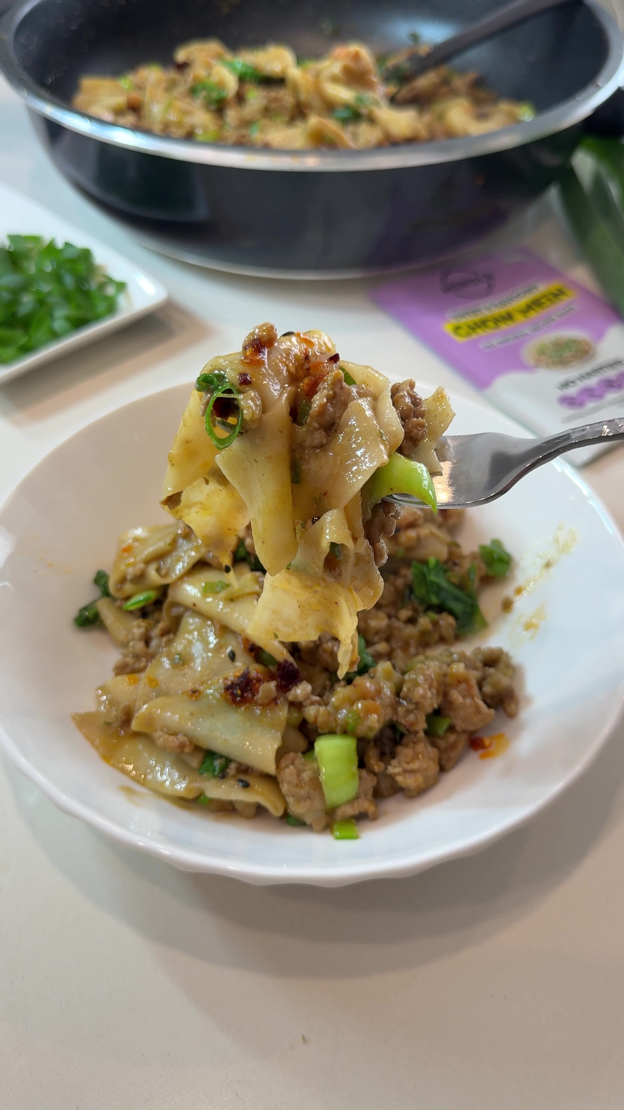 TikTok post by @breesyummycreations for Mingle Seasoning. Caption reads: Who knew wonton wrappers make the best noodles? A....