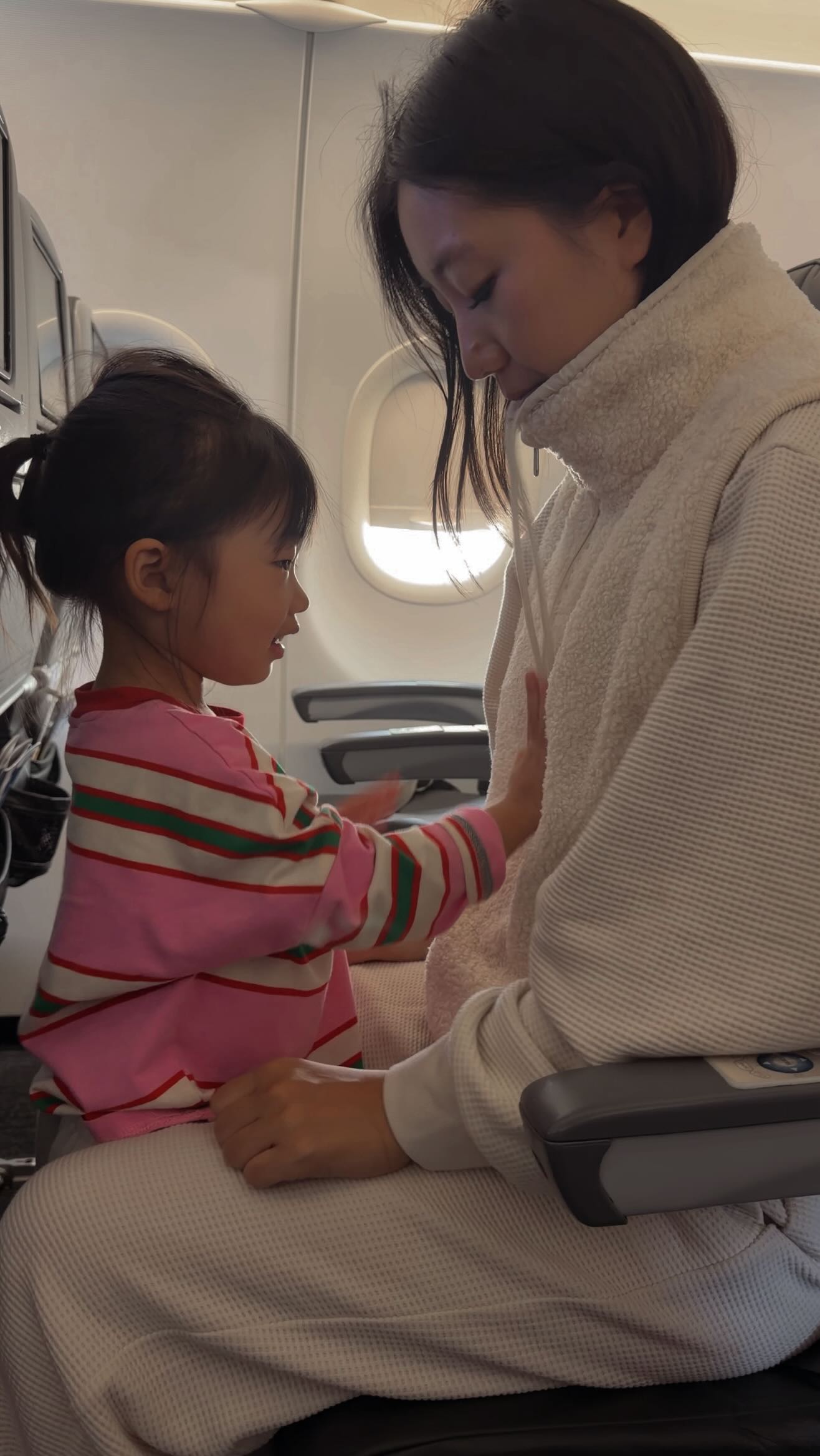 Instagram post by @esthersoyunpark for Athleta. Caption reads: #AthletaPartner #PowerOfShe Traveling 7 hours with....