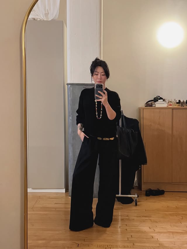 Instagram post by @heyclaire for Everlane. Caption reads: staying cozy until 2026
@everlane #everlanepartner....