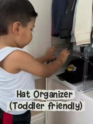 TikTok post by @s.zammm for Vtopmart. Caption reads: [...] ☝🏽 We love this hat organizer from....