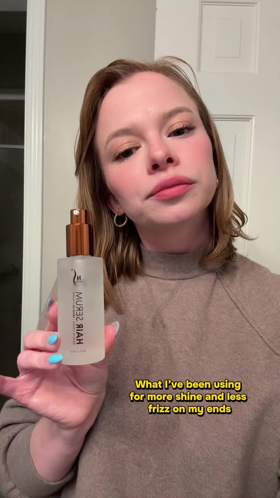 TikTok post by @shannondesherow for HerStyler Haircare. Caption reads: So far I’ve been enjoying this hair serum for....