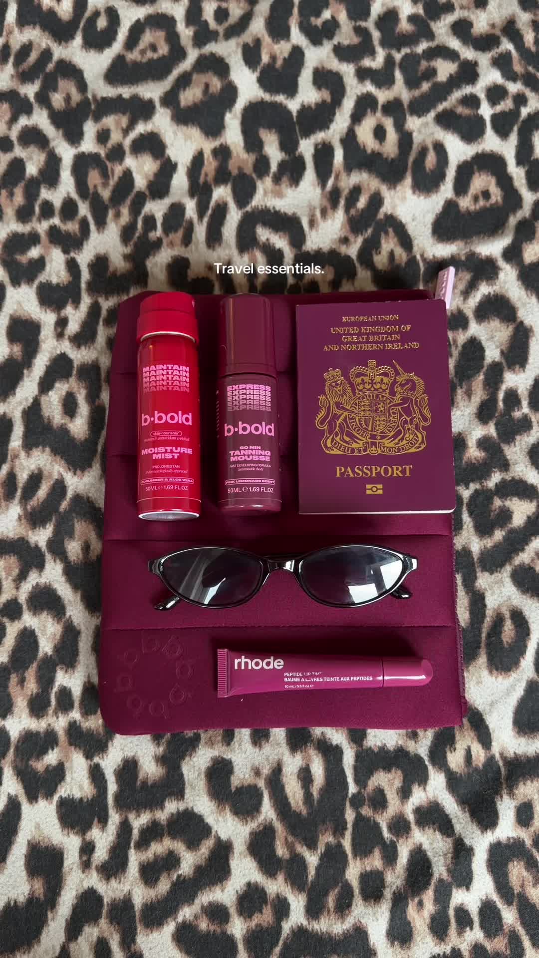 TikTok post by @lucyjadeflynn for bBold Tan. Caption reads: @b•bold 💕⭐️☁️✈️ #travelessentials....