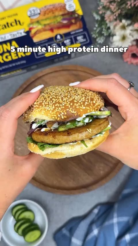 Instagram post by @wearejustthe3ofus for Safe Catch. Caption reads: [...] Tuna Burger incoming 🥒🍣 The new....