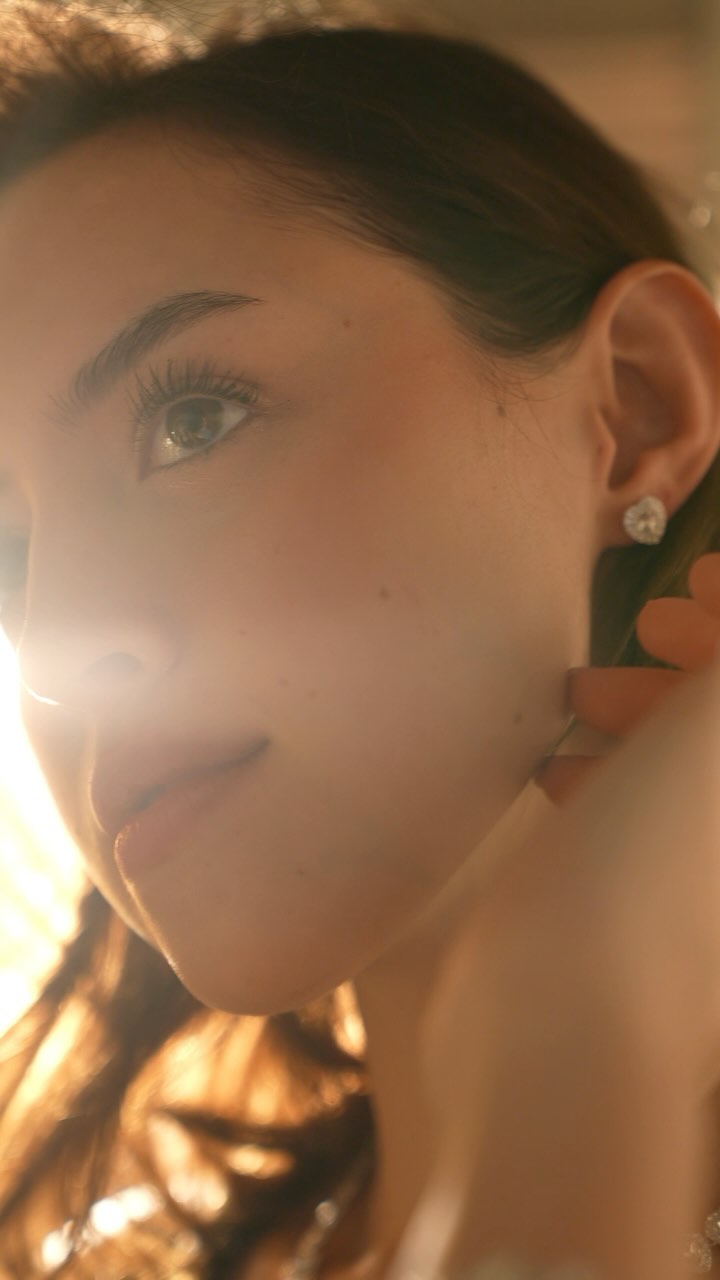 Instagram post by @ece.imre for SWAROVSKI. Caption reads: beware of the flashing lights when you wear your....
