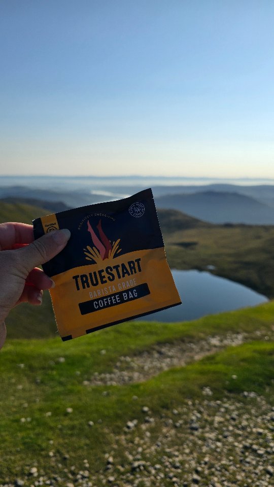 Instagram post by @claireztravels for TrueStart Coffee. Caption reads: [...] need? ✌️ A 4am get up fuelled by....