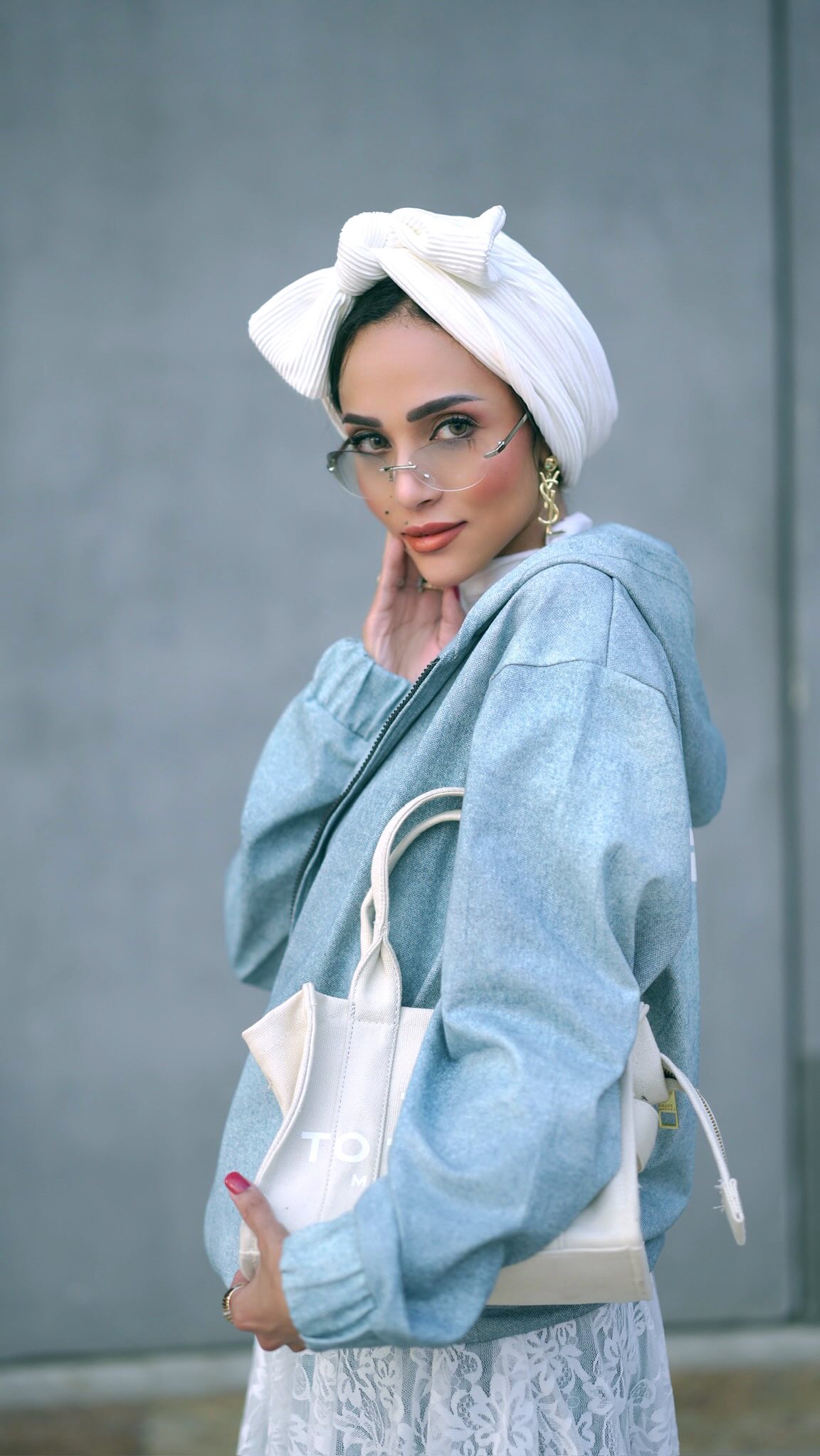 Instagram post by @dr.sarah.pedia for The Giving Movement. Caption reads: Denim days, giving ways. 💙 @thegivingmovement....