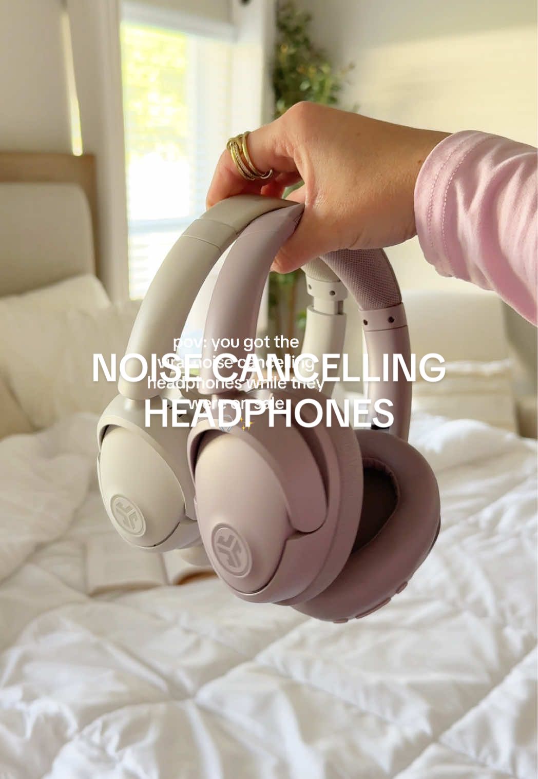 TikTok post by @hannahbentley for JLab. Caption reads: [...] #headphones #jlab #jlabheadphones....