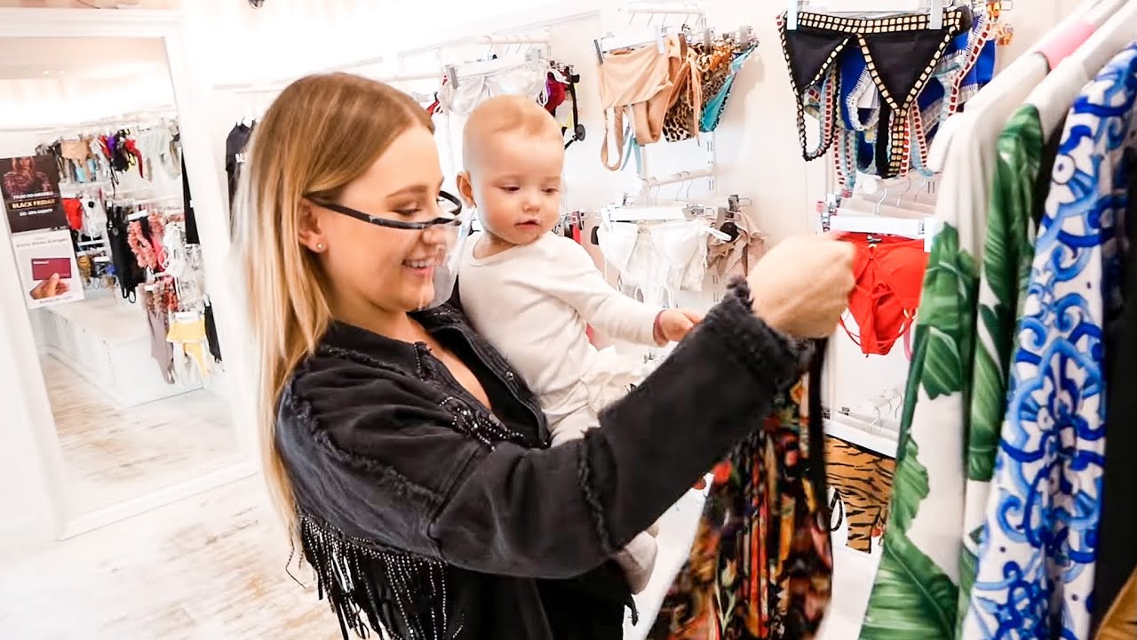 YouTube post by @Andziaks for MOLIERA2. Caption reads: VLOG : RODZINNE ZAKUPY W MOLIERA2!🛍 * WYDALIŚMY....