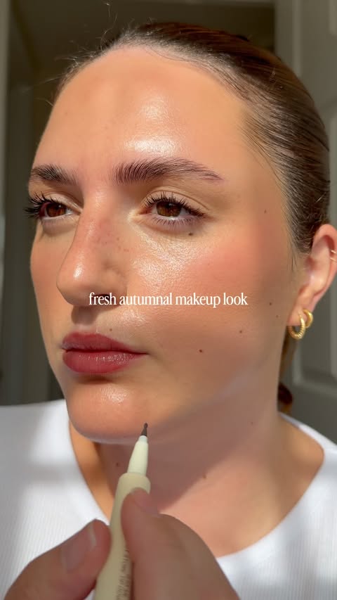 Instagram post by @thewrightglow for MERIT. Caption reads: [...] kamo drops serum foundation @merit blush....