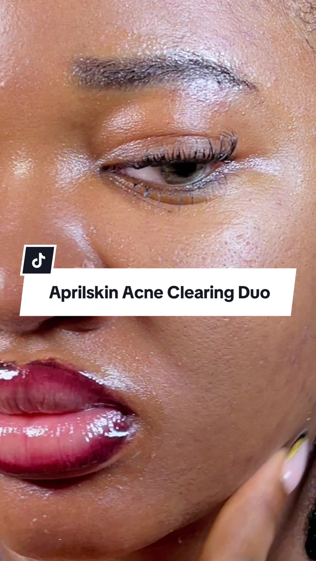 TikTok post by @__theskinedit for APRILSKIN. Caption reads: APRILSKIN CALENDULA PEEL-OFF MASK + CARROTENE IPMP....