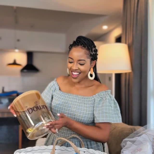 Instagram post by @kambuamuziki for downy. Caption reads: My favorite laundry partner stopped by with some....