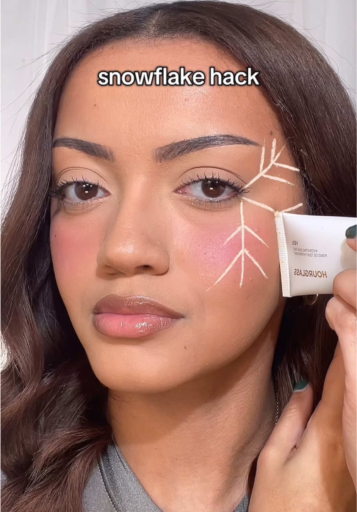 TikTok post by @dominiqueallison for Collection Cosmetics. Caption reads: Christmas snowflake hack ❄️  @collectioncosmetics....