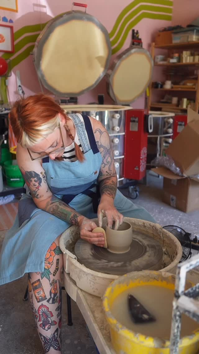 Instagram post by @cmwceramics for Hedley & Bennett. Caption reads: Obsessed with this new split leg, potters apron....