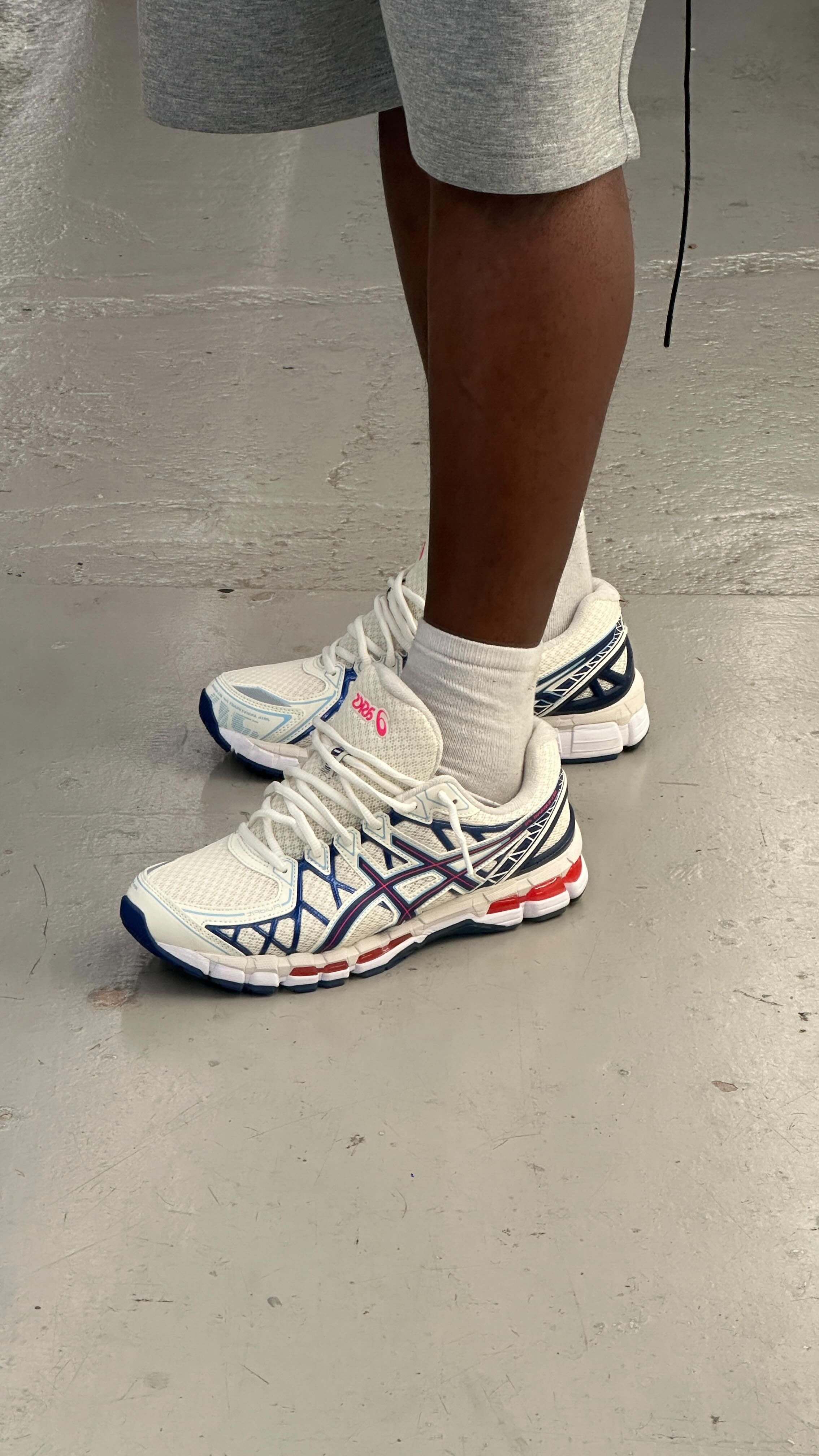 Instagram post by @tolu.olaf for size. Caption reads: [...] looking too good 🔥🔥 @asics_sportstyle....