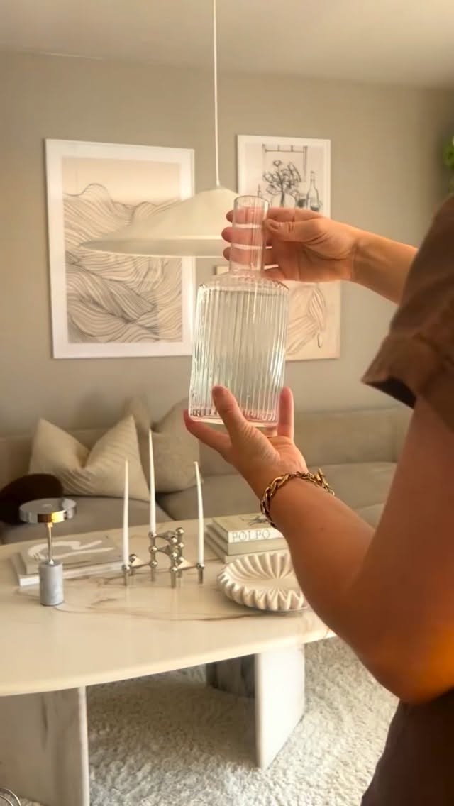 Instagram post by @phoebeknowsdecor for Serena & Lily. Caption reads: #ad
Using this sculptured candle holder from....