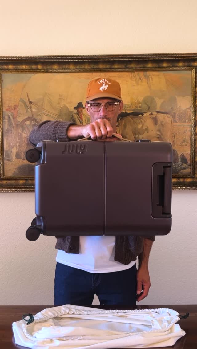 Instagram post by @tylerjwwood for July. Caption reads: [...] pleasurable.
The #carryon trunk from @july ,....