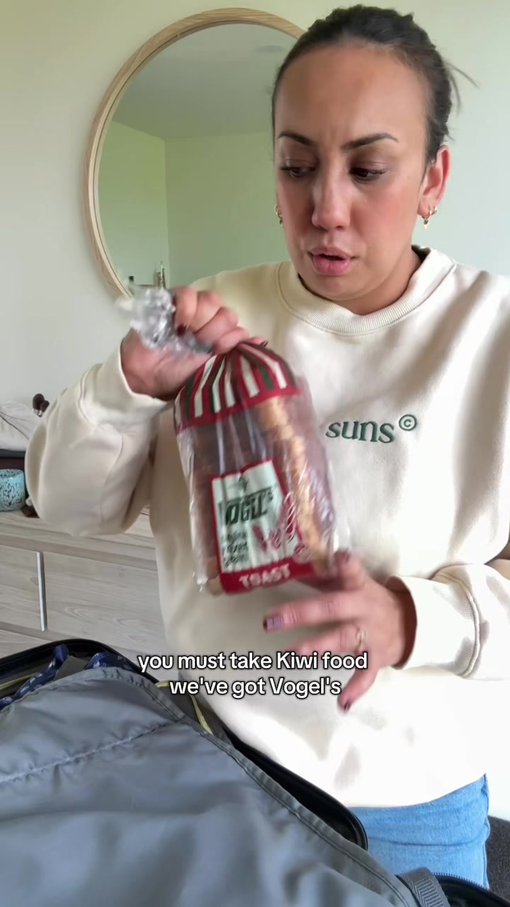 TikTok post by @lisaperese_ for Qantas. Caption reads: Heading to Brisbane with @Qantas for a moment that....