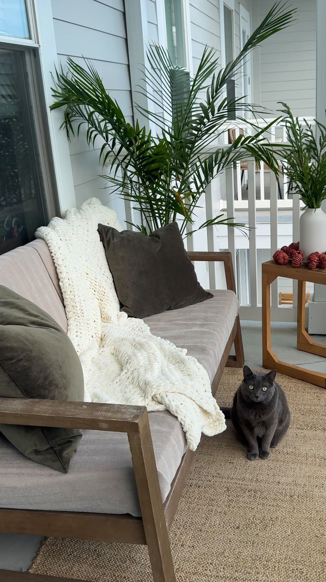 Instagram post by @cary_ashley_ for Nolan Interior. Caption reads: [ad] Fall Porch Refresh ✨ ft. @nolan_interior....