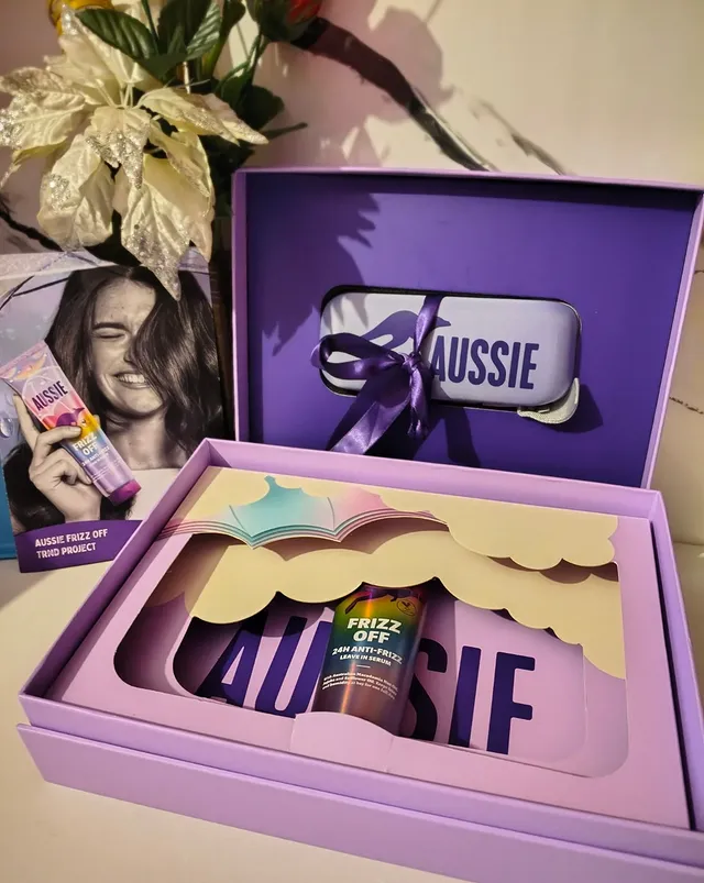 Instagram post by @andrea.chereji.9 for Aussie Haircare. Caption reads: Ohh wow 😍🥹🎀 let's take a moment to appreciate....