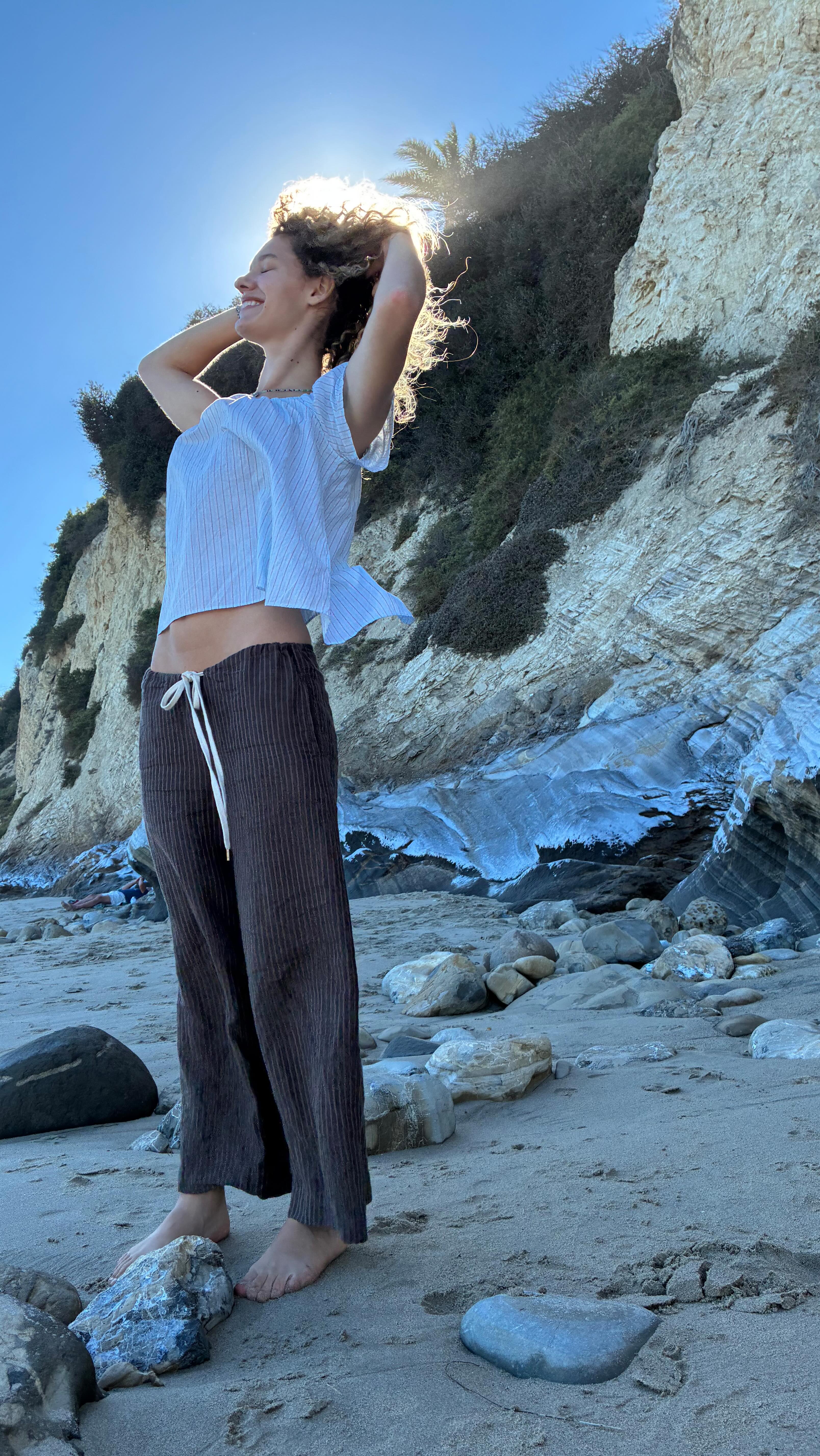 Instagram post by @partyatlouises for Athena Club. Caption reads: Seaside with @athenaclub 🩵 #ad.