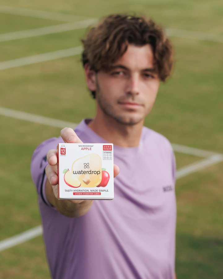 Instagram post by @taylor_fritz for Waterdrop. Caption reads: Taylor’s freshest match point 🍎

@taylor_fritz....
