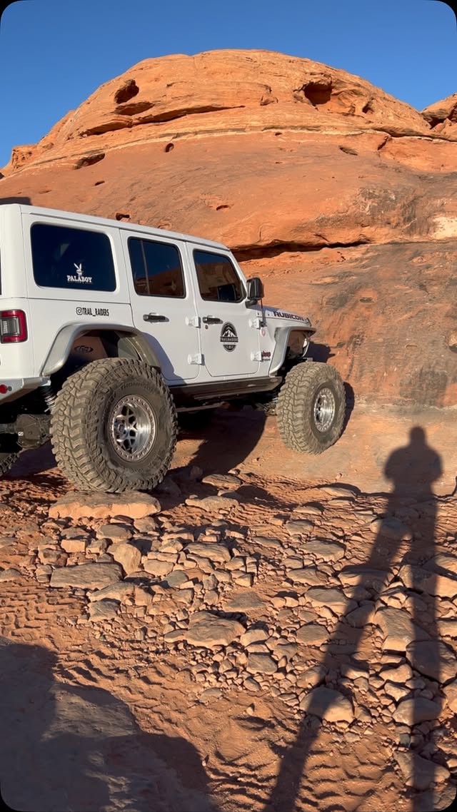 Instagram post by @trail__raiders for ORACLE Lighting. Caption reads: When you’re going up a steep climb, all you see is....