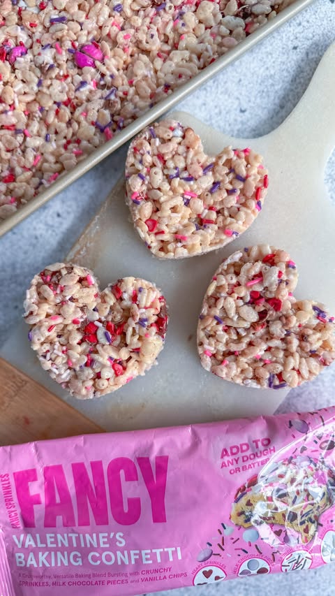 Instagram post by @makefoodlovely for Fancy Sprinkles. Caption reads: 💗FANCY RICE KRISPIES 💗

These heart-shaped Rice....