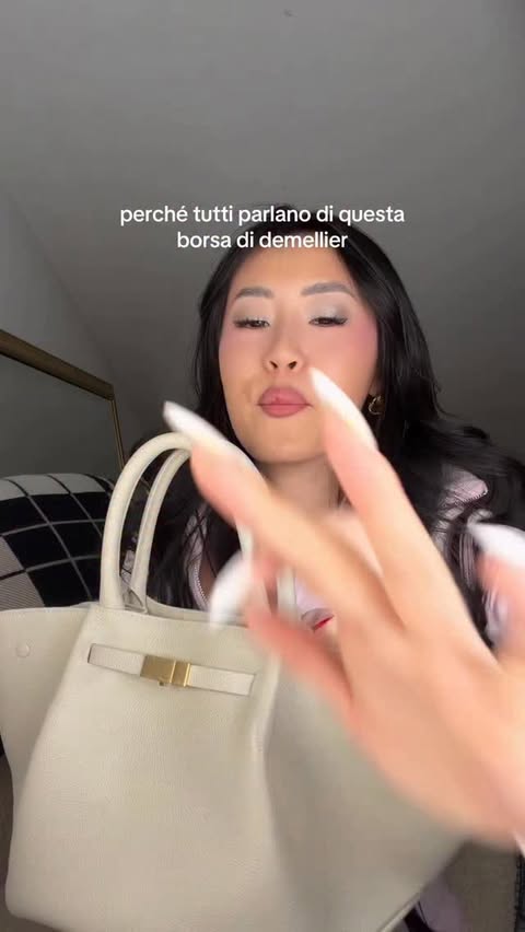 Instagram post by @jingherly for DeMellier. Caption reads: gigantesca 🥹 @demellierlondon #gifted.