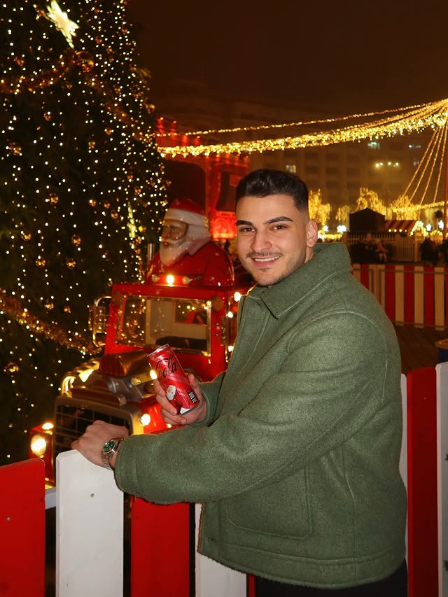 Instagram post by @iustinchiroiu for Coca-Cola Romania. Caption reads: Sarbatorile vin! Jingle-ul Coca-Cola ii celebreaza....