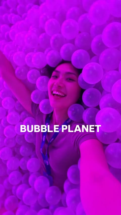Instagram post by @kateluuuuu for Bubble Planet. Caption reads: [...] of bubbles, colors, and pure joy 🫧✨....