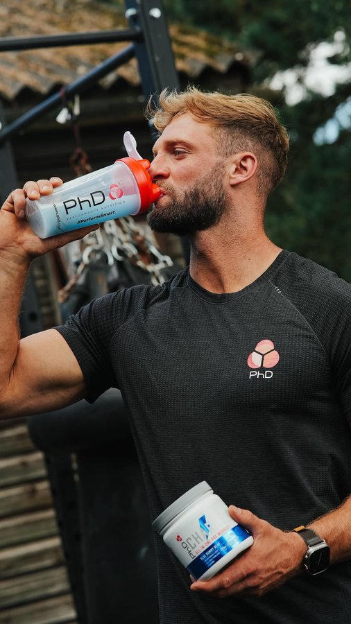 Instagram post by @tomkempfitness for PhD Nutrition. Caption reads: [...] for 10% discount

@farm_fitness....