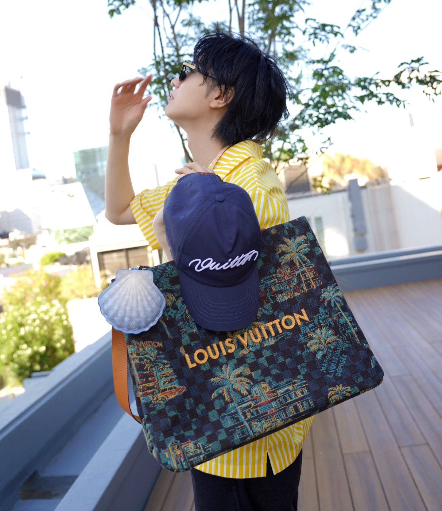 Instagram post by @dorisakurada for Louis Vuitton. Caption reads: LOUIS VUITTON

Summer kit from Pharrell....