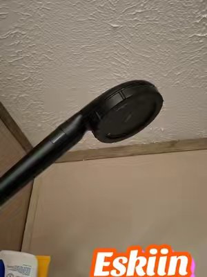 TikTok post by @lowandadavis2 for Eskiin. Caption reads: @eskiin filtered showerhead 🔥🔥💯💯🔥 [...].