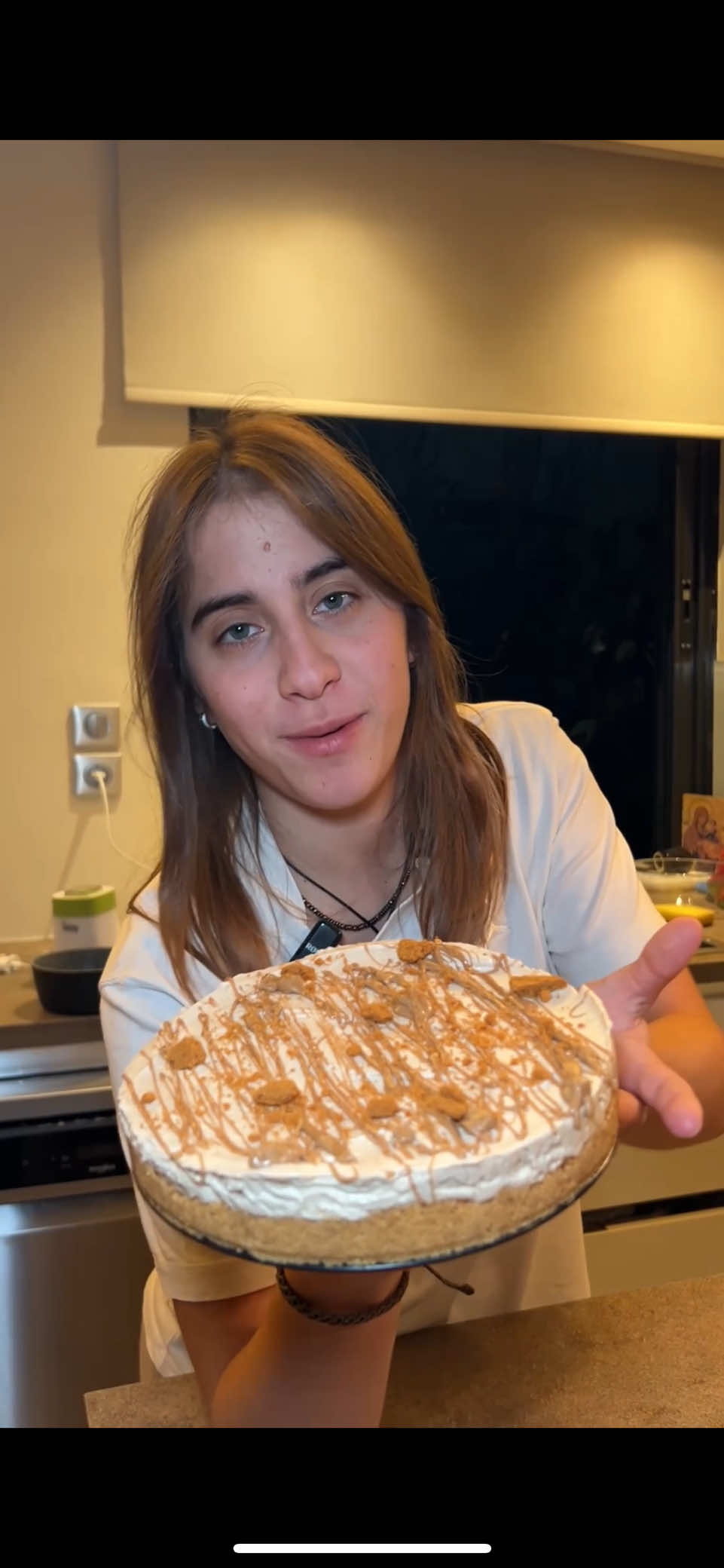 TikTok post by @mixaela.ll for Lidl Hellas. Caption reads: Cheesake μελομακάρονο 🍯με πραλίνα από @Lidl....