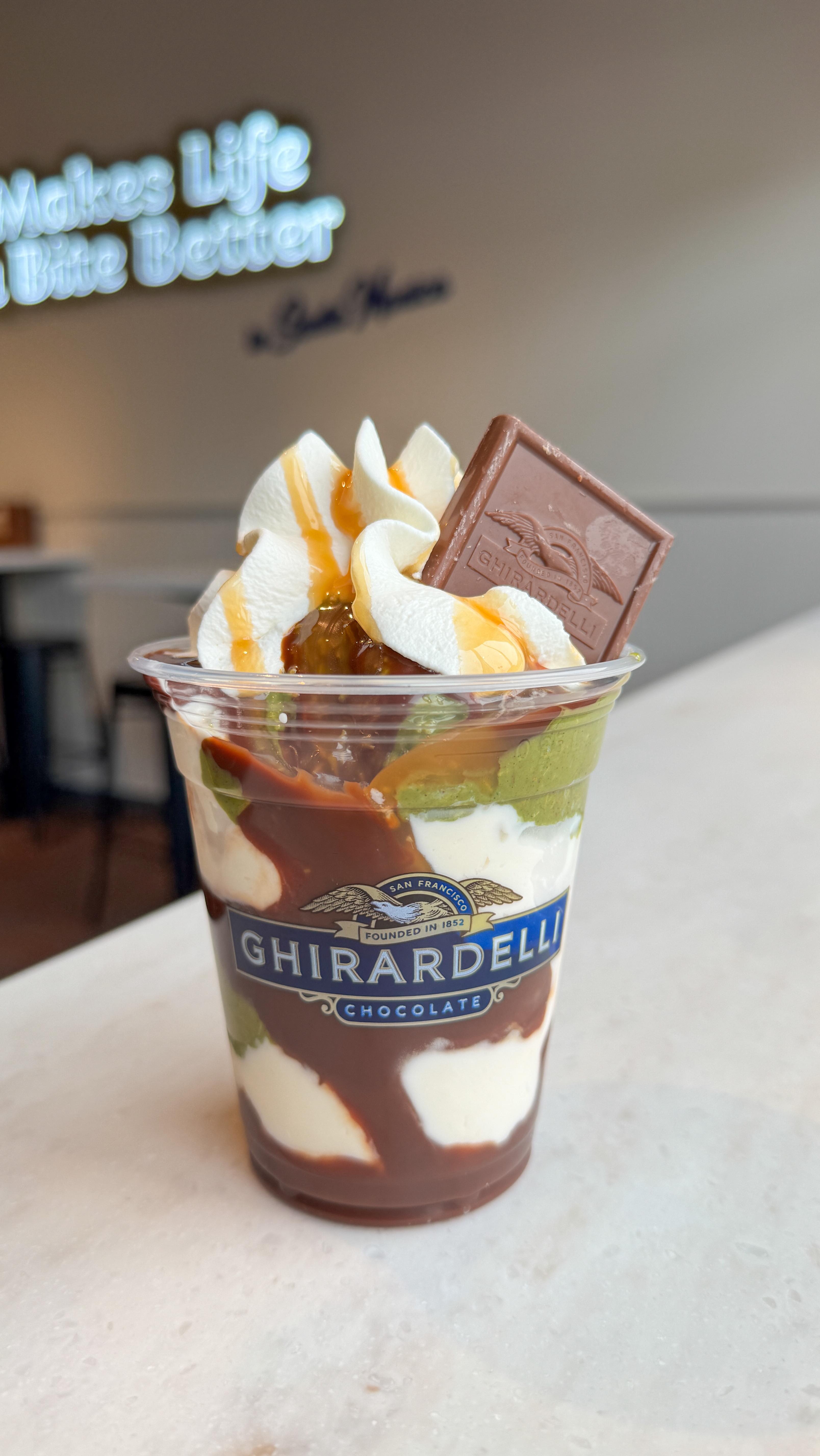 Instagram post by @nate.eatz for Ghirardelli. Caption reads: Trying the new Dubai Style Chocolate Sundae from....