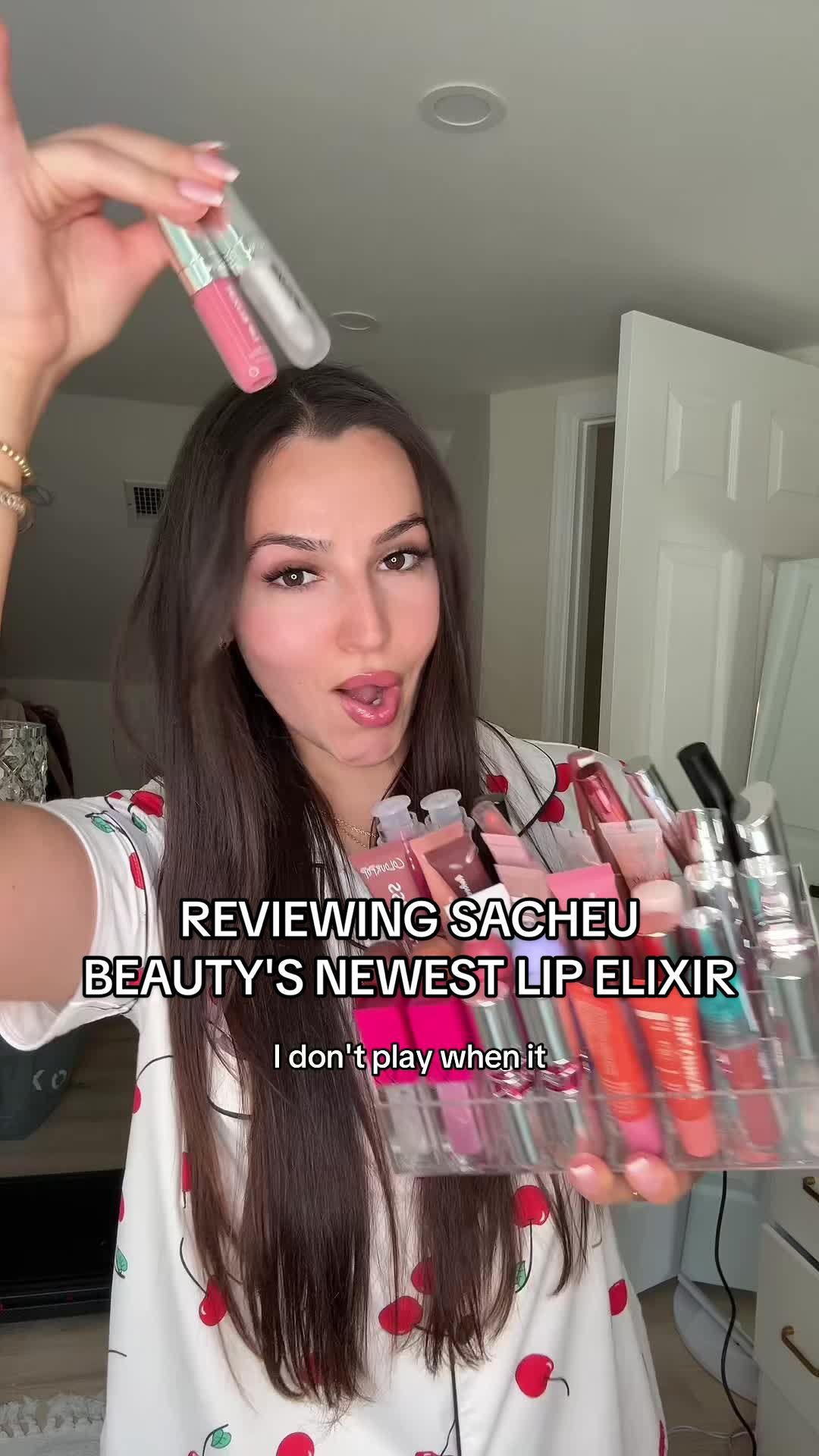 TikTok post by @abbyfridman for Sacheu. Caption reads: Trying @SACHEU Beauty US newest lip elixir in the....