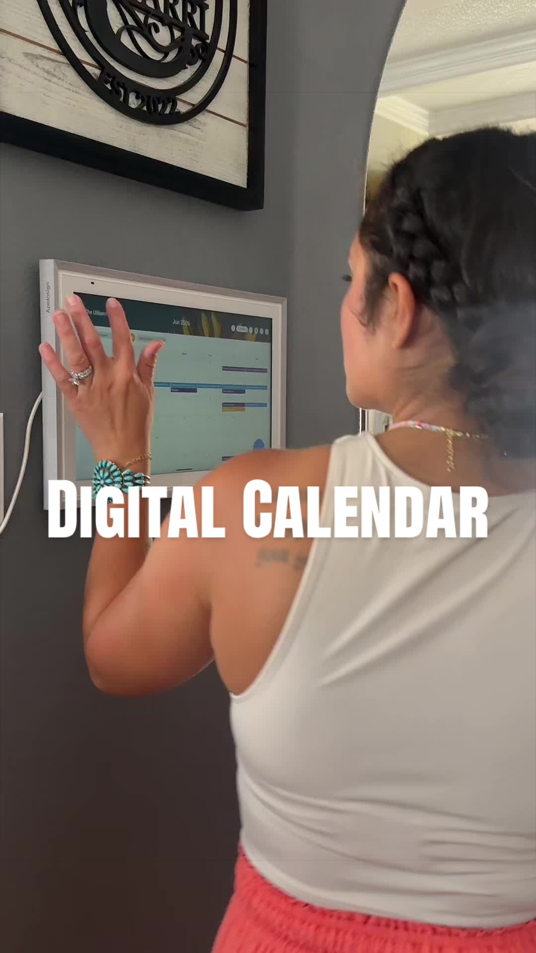 TikTok post by @kienavela for Apolosign. Caption reads: [...] family organized. 📅✨ #DigitalCalendar....