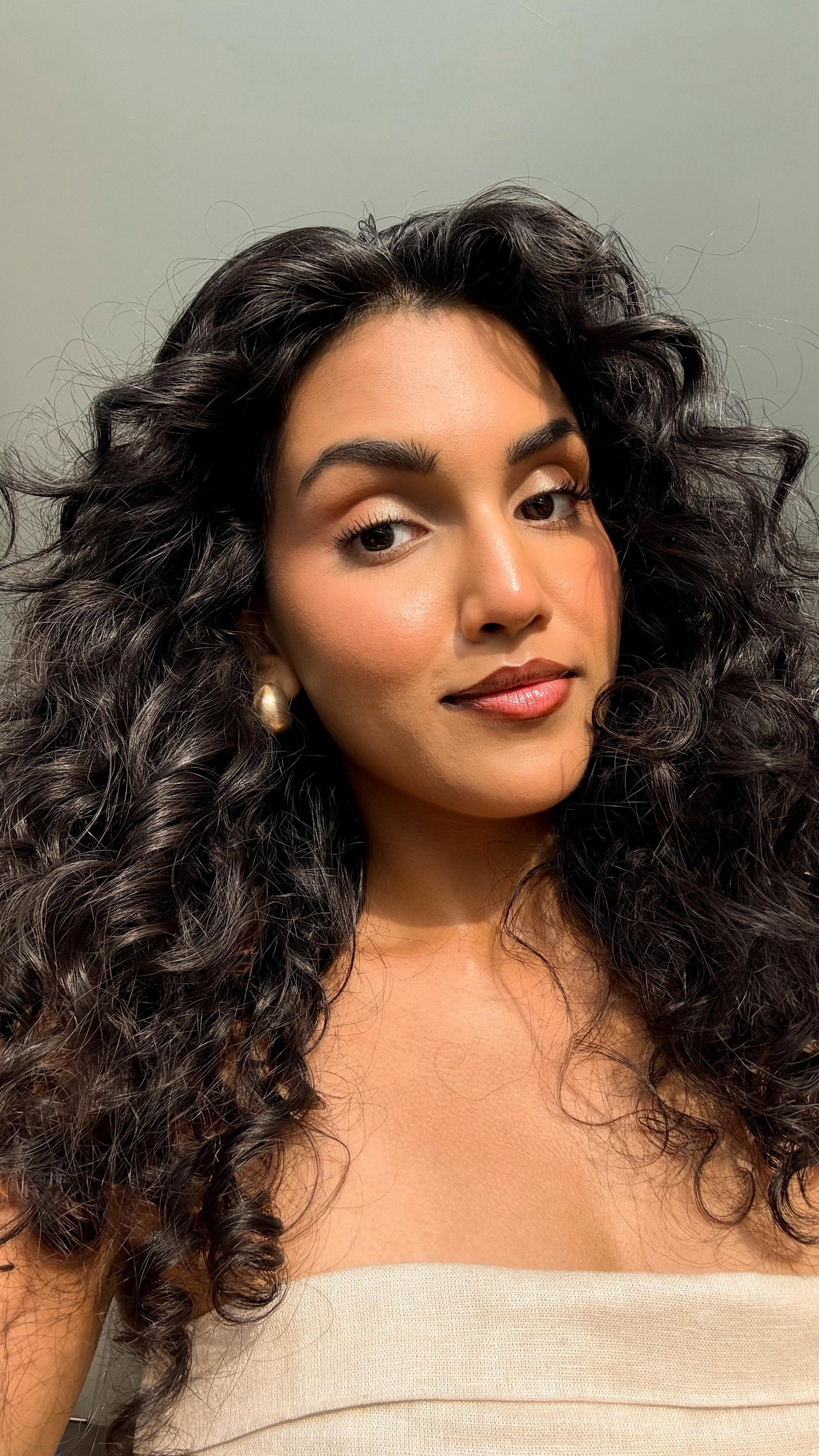 Instagram post by @vishakhalaka for Moroccanoil. Caption reads: look at that VOLUME 🫢 @moroccanoil’s new Texture....
