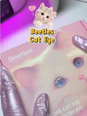 TikTok post by @nathalie_nails9 for Beetles Nail Boutique. Caption reads: Cat eye Hel Polish kit de @Beetles Nail Boutique .....