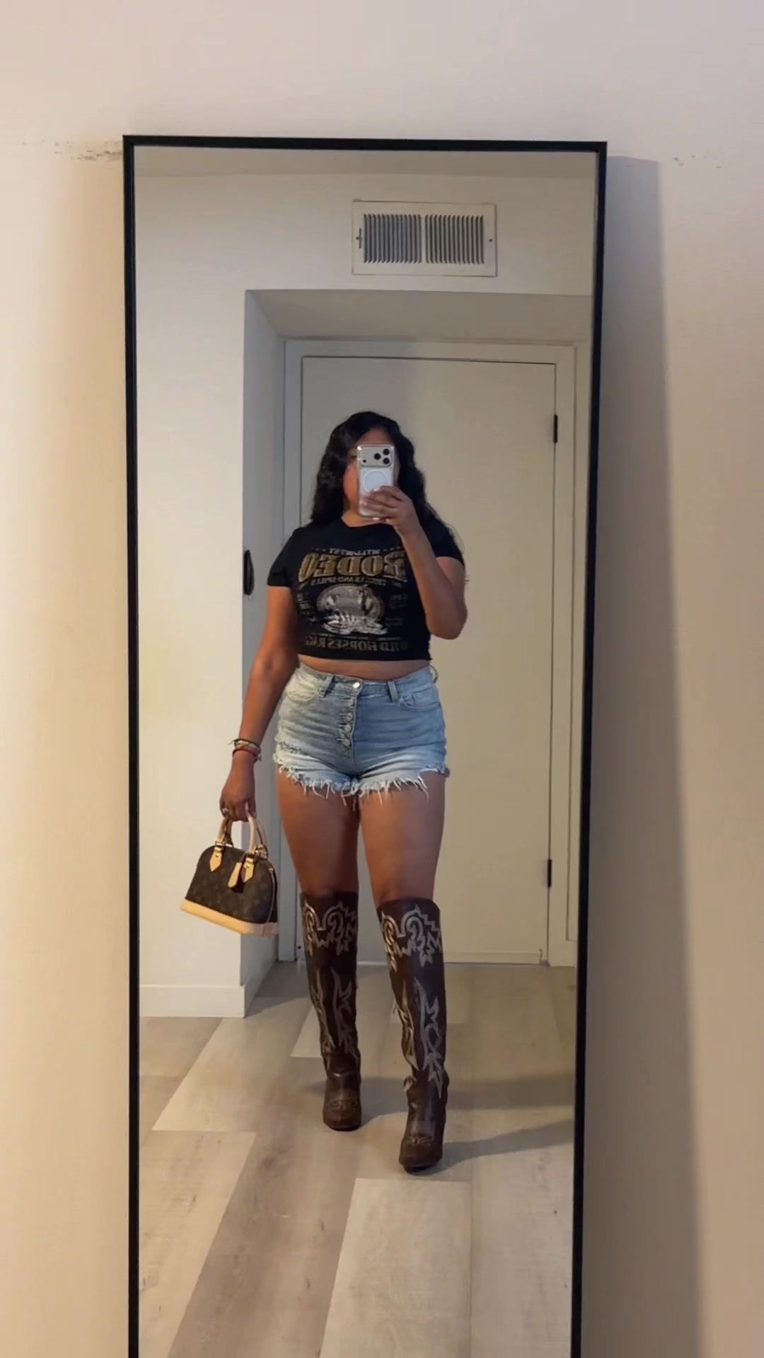 TikTok post by @yasdelatorre1 for Vogatiques. Caption reads: @CANANA OFFICIAL #fy #fyp #outfit #denimshorts....