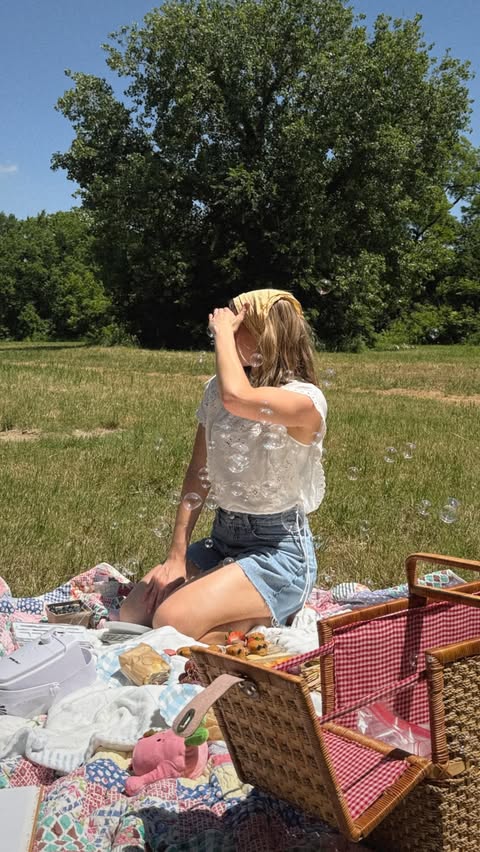 Instagram post by @michellereed for Hallmark. Caption reads: [...] a picnic 🧺🌷 #AD Especially with our....