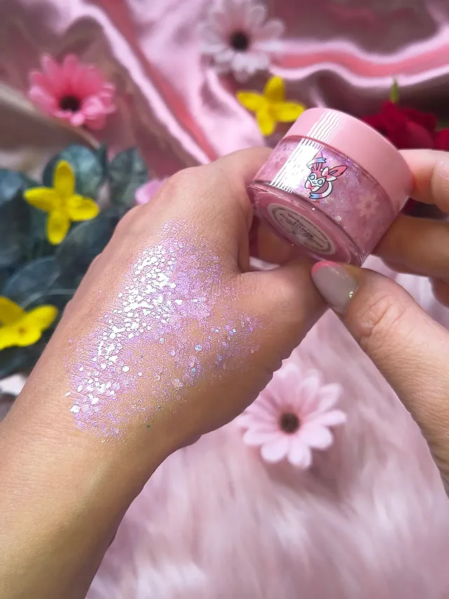Instagram post by @romalovanie for ColourPop Cosmetics. Caption reads: 💫Magic Glitter Gel✨ @colourpopcosmetics x Pokemon....