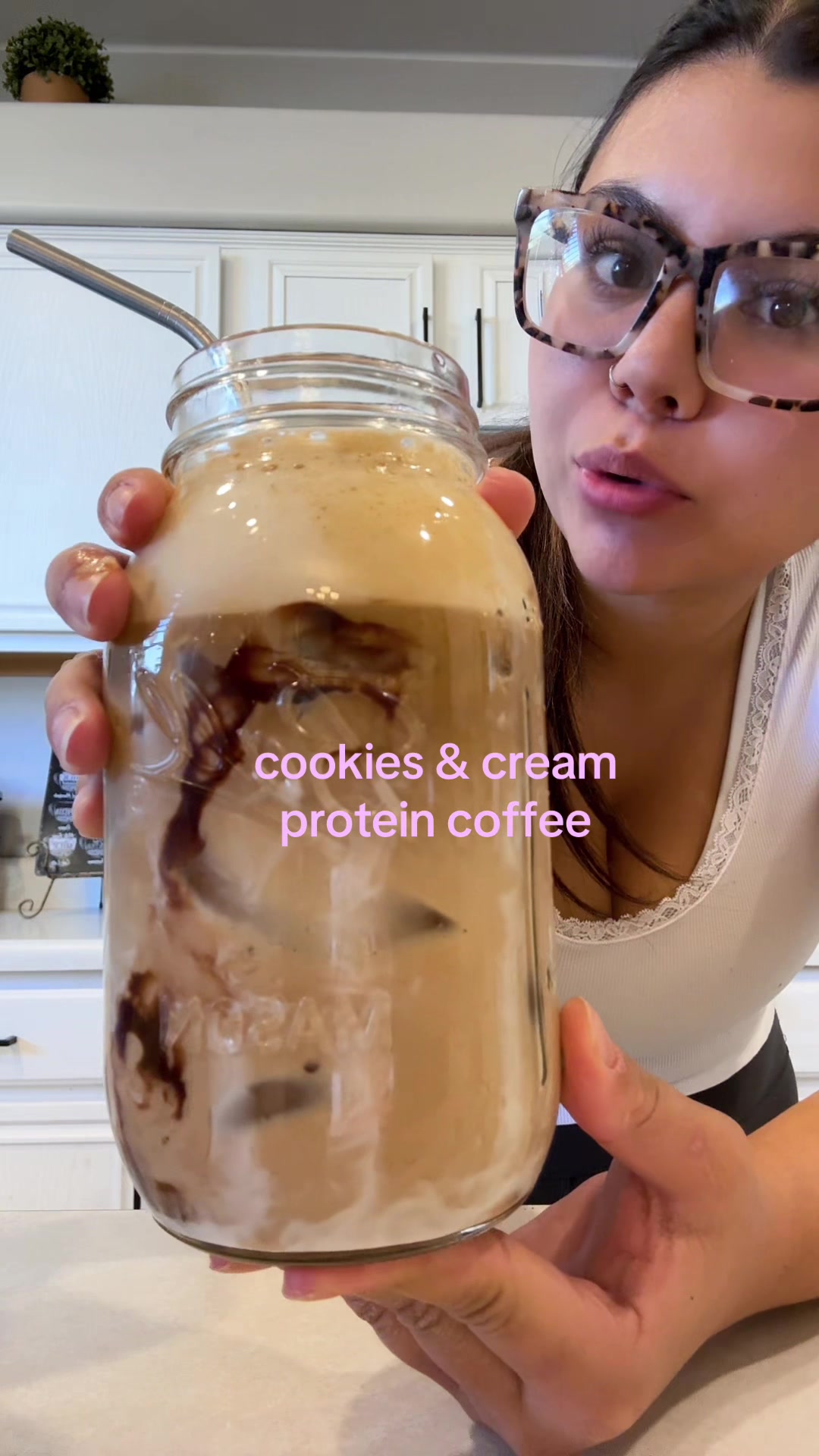 TikTok post by @eatingwithbai for Jordan’s Skinny Mixes. Caption reads: cookies and cream proffee🤭🍪 @Caffeine, Candles &....