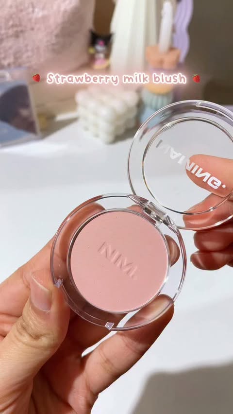 Instagram post by @skincarewithtai for YesStyle. Caption reads: Strawberry milk blush 🍓🥛 NAMING Fluffy Powder....