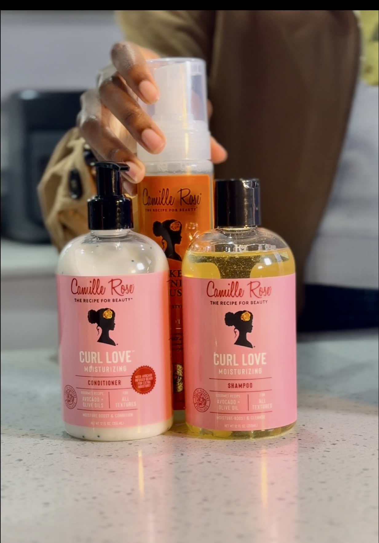 TikTok post by @afro.alchemist for Camille Rose. Caption reads: [...] year, I just want curl love. 💕 Ft. @Camille....